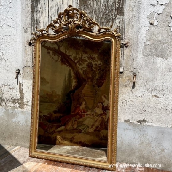 Miroir rocaille Napoleon III bois et stuc doré 